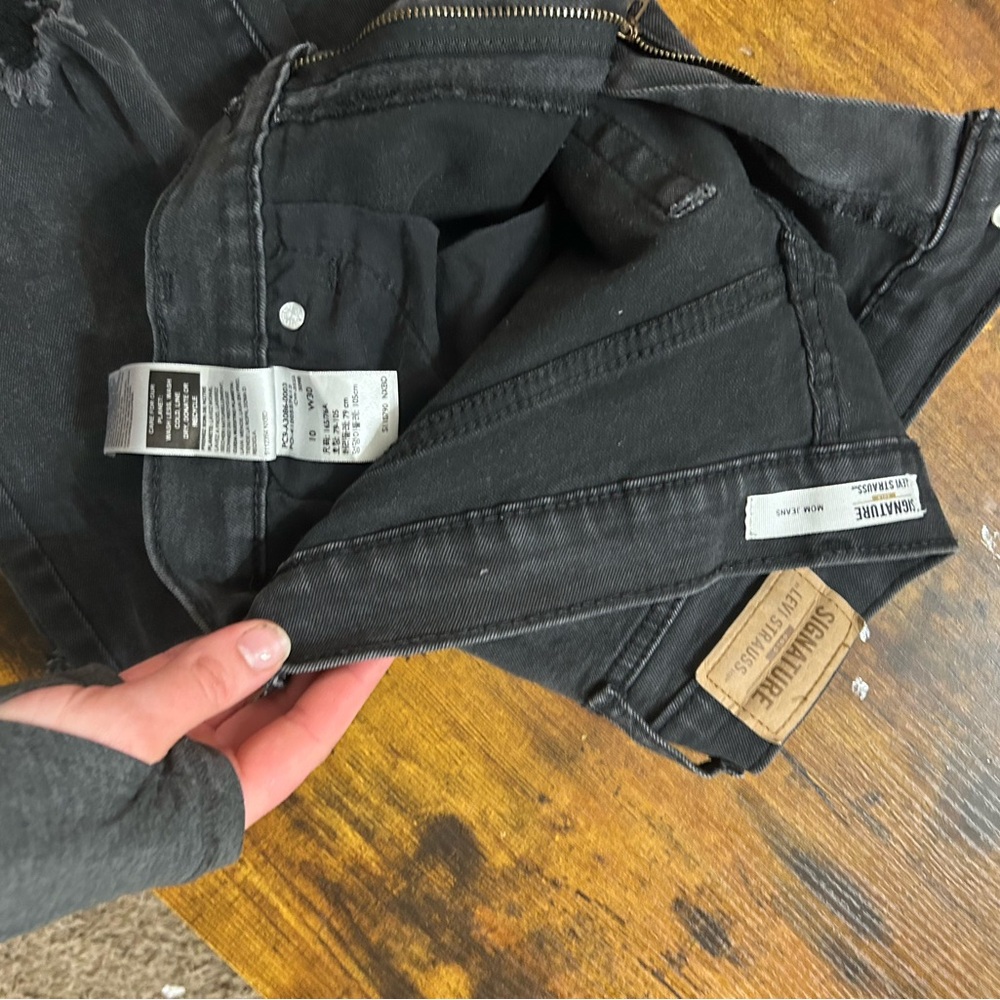 Levi Strauss black distressed Mom Jean. Super stretch